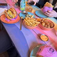 Kimchi chickin’ burger, fries, tater totes   at Wholesome Junkies in Manchester