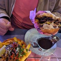 Thai fries and a festive burger with an extra patty and gravy at Wholesome Junkies in Manchester