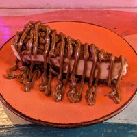 Biscoff cheesecake is one of the best cheesecakes I've ever had in my life, vegan or otherwise at Wholesome Junkies in Manchester