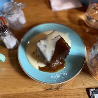 If having desserts this Sticky Toffee Pudding with Custard was the bomb😋!!!!  at Wholesome Junkies in Manchester