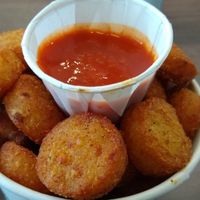 Tater tots with buffalo sauce at Wholesome Junkies in Manchester