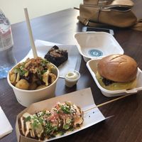 Jerk tots, biscoff brownie, needless burger and Katsu curry corn dog  at Wholesome Junkies in Manchester