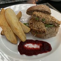 Vegetable burger with beet and chips  at Avocado in Crete