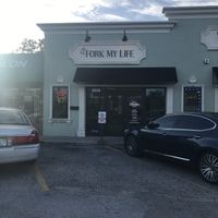 The entrance  at Fork My Life in Sarasota