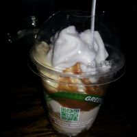 Vegan sundae with vanilla malt cashew ice cream, cookie dough soft serve ice cream, coconut whipped cream, marshmallow topping, and a cherry on top. at Blythe Anne's in New York City