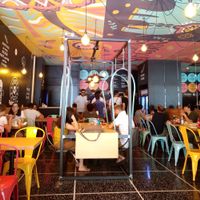 View toward counter to order and pick up food at Flower Burger in Bologna