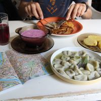 Cold beetroot soup, dumplings with mushrooms, potato pancakes with mushroom souse and homemade iced tea  at Vilties Vaistinės Arbatine in Kaunas