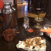 great vegetarian momos with spicy sauce on top 😋 at House of Shambhala in Tibet