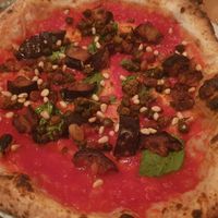 Eggplant, pine nuts, capers, sultanas, basil at Piu - Schiffbau in Zurich