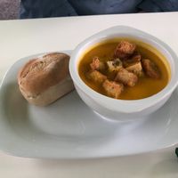 Carrot soup with a little loaf of bread at Vista Bar and Restaurant in Matlock