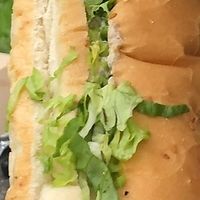 Cheesesteak (trust me, the inside is loaded with seitan, garlic mushrooms, cheese, chipotle aioli, and more; it’s not just lettuce) at Seitan's Realm in Columbus