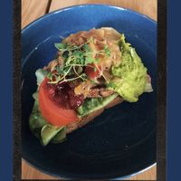 Bean and seaweed burger with baked onions, pea purée and lingonberry jam 🥪 at FRØ in Tromsoe