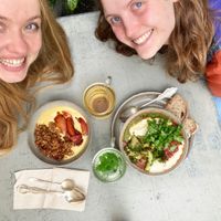 Hummus bowl (not gluten free bread) + sweet potato carrot smoothie bowl with seasonal vanilla nectarine compote and granola + herbal teas. at ÆNDRÈ in Hamburg