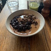 Mocha Bowl with additional; Nut Butter, Berries, Coco Granola. Also  a Green Juice at ÆNDRÈ in Hamburg