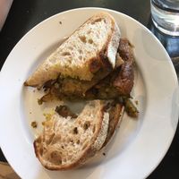 Vegan Breakfast Sandwich- half portion of vegan frittata at Retrograde Coffee Roasters in Sebastopol