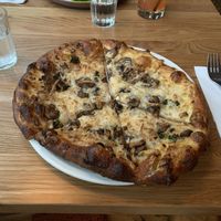 Kale, mushroom and caramelised onion pizza   at Earls Kitchen + Bar - Robson in Vancouver