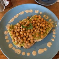 Avocado and chickpea on toast  at The Source Cafe in Siem Reap