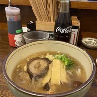 Thick udon soup with fried tofu  at Menkui Kinya in Kyoto