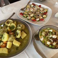 Artichokes with lemon sauce, baby zucchini with vegan mayo and truffle, yellow lentils  at Amaltheia in Katerini