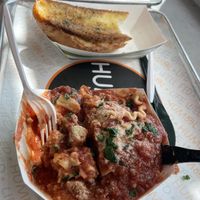 Lasagna and garlic bread at HUMBL in Orlando
