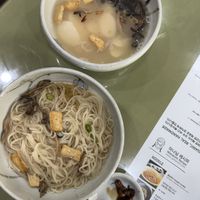 Both yum. Rice cake soup and hot noodles  at Mananim Recipe in Seoul