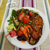 £12.80. Stuffed aubergine with all of the salads. at V Café at the Institute in Guildford
