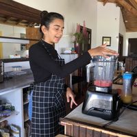 Keshani making a smoothie with the Vitamix. at Bistro Pointe Taylor in New Richmond
