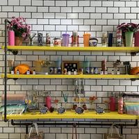 Alter and merch shelf    at Sugar Taco in Los Angeles