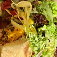 This is their vegan garden burger. Photo doesn’t do it justice but took it in a to-go box in the car. So fresh & delicious !  at The Wild Plum Cafe in Monterey