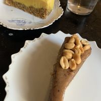Raw lemon curd cheesecake and peanut cheesecake   at Café Holmgången in Malmo