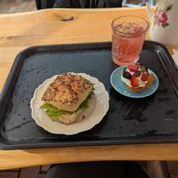 Vegansk Mandelmussla pastry and sourdough sandwich with cashew-cheese filling at Slottsträdgårdens Kafé in Malmo
