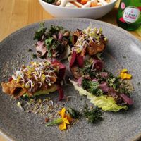 Two bites with black bean hummus, portobello, pickled onion, raisin mustard, kale, miso mayonnaise, pickled carrot and Vöner. Plus mK at Tru Kitchen in Tallinn