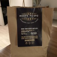 Take out/delivery bag at Roots Miami in Miami