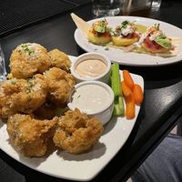 Garlic-butter parm wings   at Life on Mars in Seattle