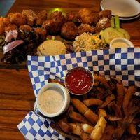 Fries, Mars platter in the background at Life on Mars in Seattle