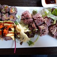 Avo Maria tiger rolls (left bottom), cucumber carrot cabbage maki (left top) and shiitake IO (right) at Tiger Club Vegan Sushi in Berlin