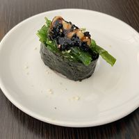 Caviar and algae salad sushi roll  at Tiger Club Vegan Sushi in Berlin
