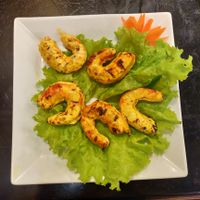 Garlic and chili shrimp

We also had garlic rice, wheat meat in sauce, roasted vegetables.  at Sen Vegan House in Ho Chi Minh City