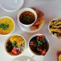 dal, chickpea & spinach curry with puri, bhajis, okra fries, potato and mushy pea cake at Bundobust in Liverpool