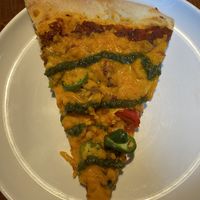 Beyond Sausage & pesto pizza. Red sauce & vegan cheese subbed    at Fields & Ivy in Lawrence