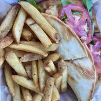 Cauliflower Po’boy and fries at Crust Kitchen and Cocktails in Wilmington