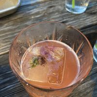 Delicious mezcal specialty cocktail with the fancy ice cube at Crust Kitchen and Cocktails in Wilmington