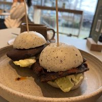 Amazing food, great people, cozy place 💚 (bao buns with marinated mushrooms - so good!)  at Tea Stories in Eindhoven