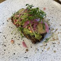 Toast with avocado 🥑   at Kupfert & Kim - Yorkville in Toronto