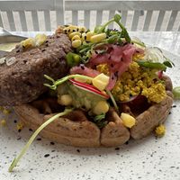 Savory waffle with addition of walnut patty  at Kupfert & Kim - Yorkville in Toronto