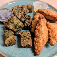 Vegan entrees of fried garlic and chive blocks (left) and curry puffs (right). Ordered as a pick up. at Klua Sathorn in Castlemaine