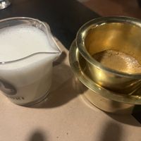 Indian style filter coffee with hot oat milk on the side  at The Old House  in Karnataka
