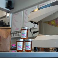Does sell local honey at Asiga in Guam