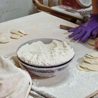 Skins being rolled flat. at Lái Xīn SùShí 來欣素食手工水餃 in Taipei