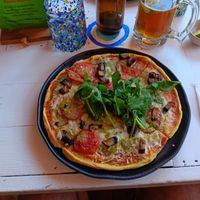 Pesto pizza with tomatoes and fresh basil at Vegan Town in Ajijic